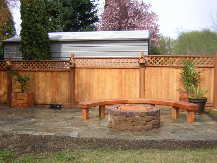Firepit, built-in bench, and fence